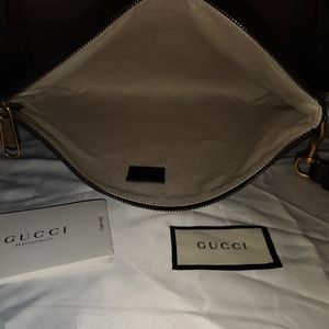 Gucci Logo wristlet clutch printed leather medium
